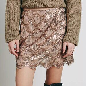 Free People — rose gold scalloped sequin mini skirt - M